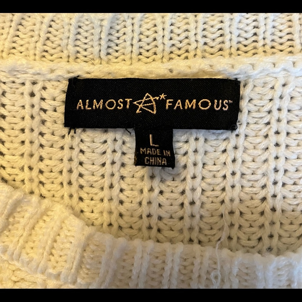 Almost Famous white sweater from Saks Fifth Ave, size large